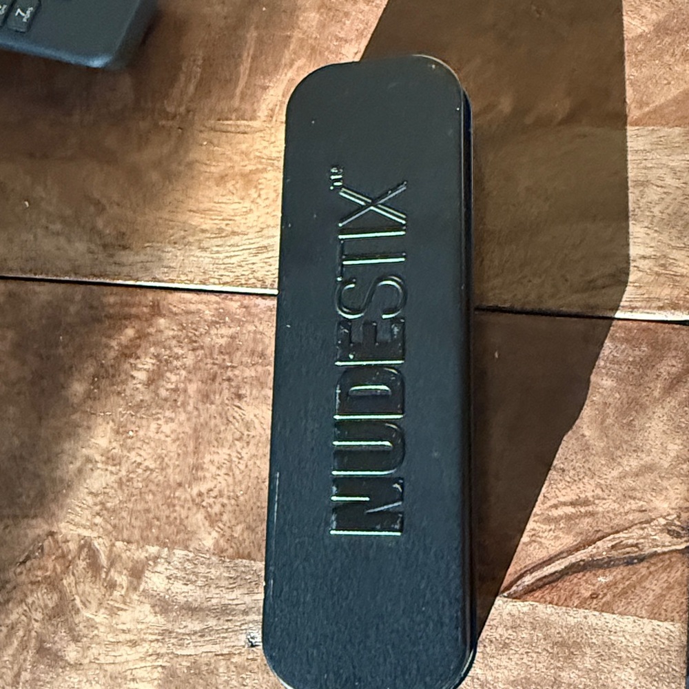 NUDESTIX Sleek Black Beauty Case
